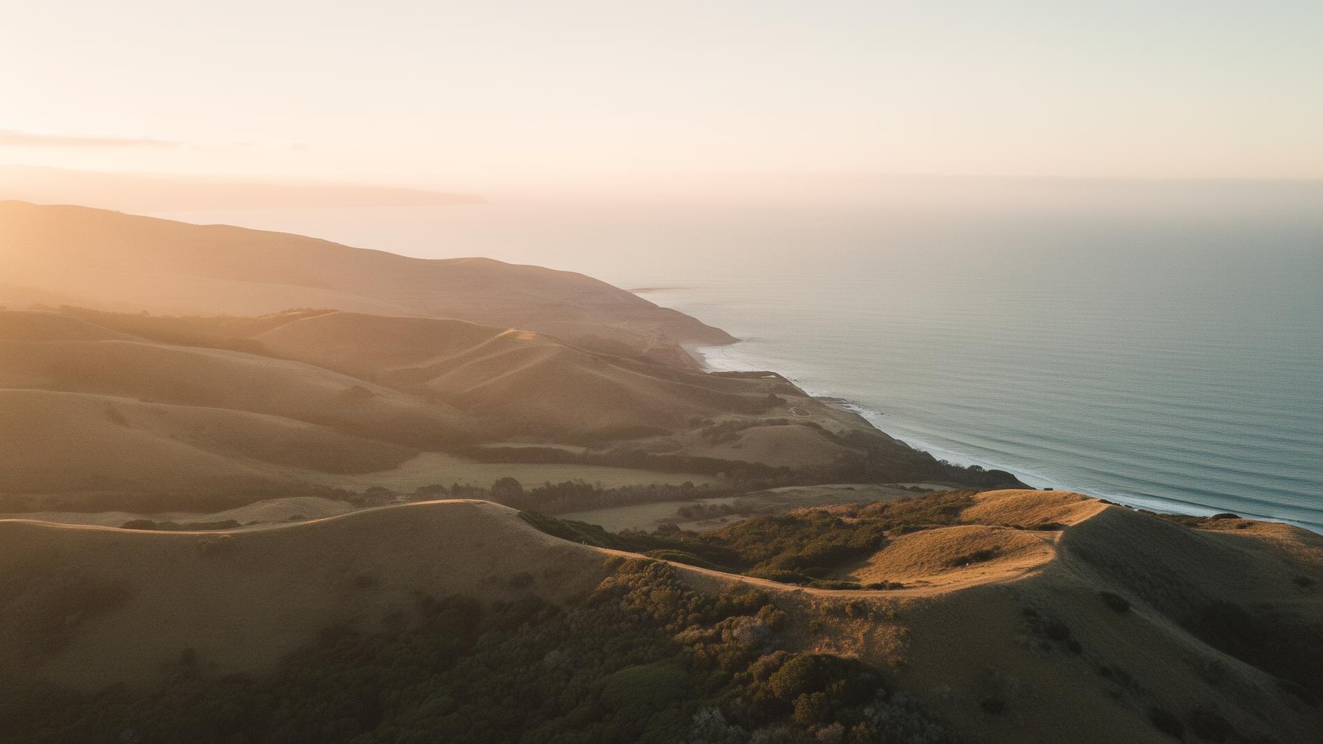 Tranquil UK coastal landscape at golden hour, evoking calm long-term financial planning